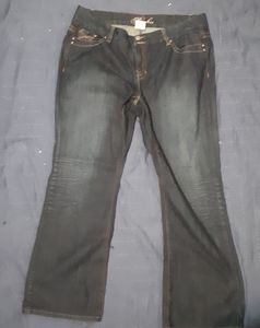 Pashu mid waisted flared leg faded wash jeans